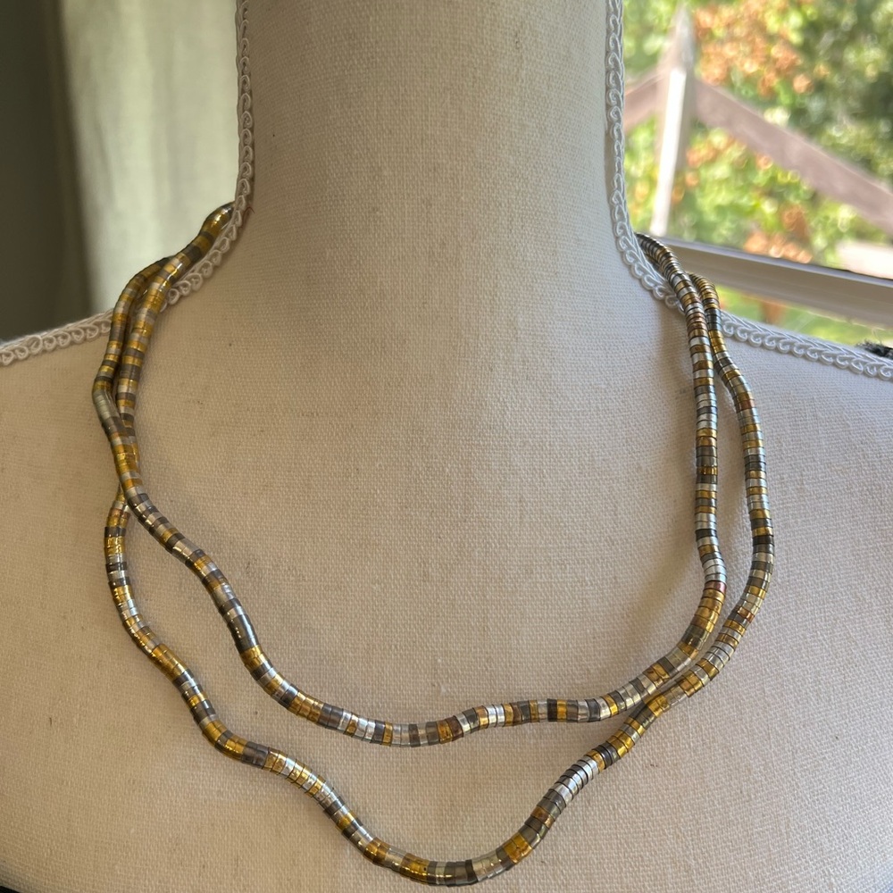 Elegant Gold and Silver Necklace.